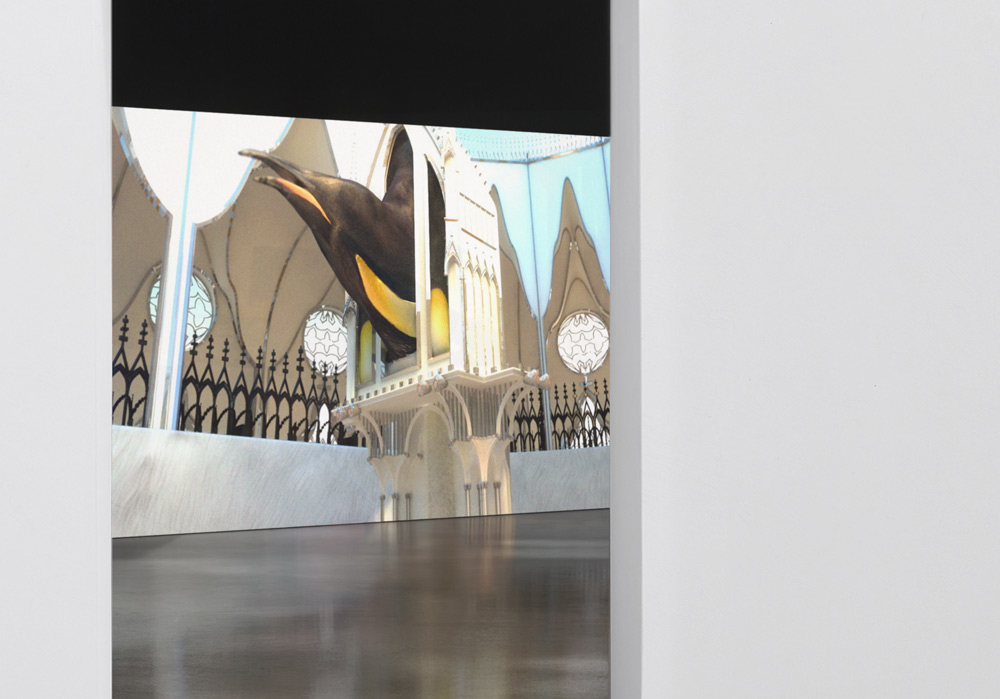 Installation view from white cube gallery showing video projection of animated short film French Penguin