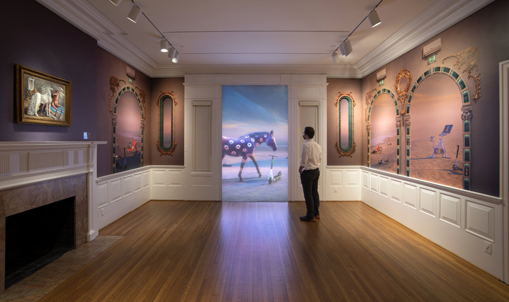 man standing in front of contemporary video projection installation in The Phillips Collection in Washington DC