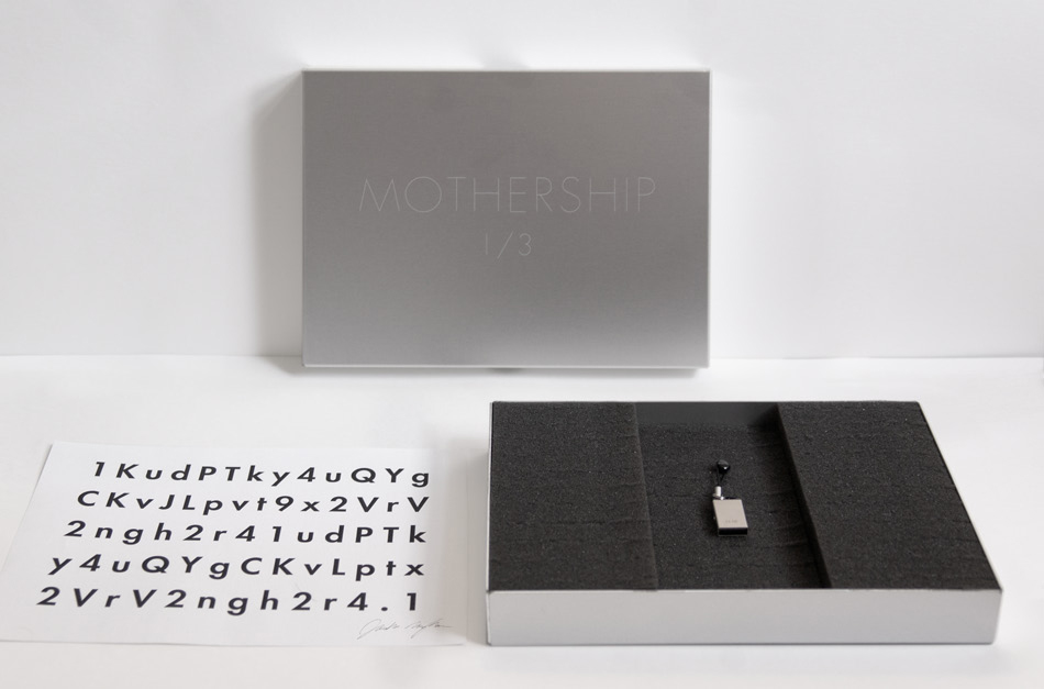 Collector's case of Mothership showing key hash derived from bitcoin blockchain transaction making this work an important prototype for modern NFTs