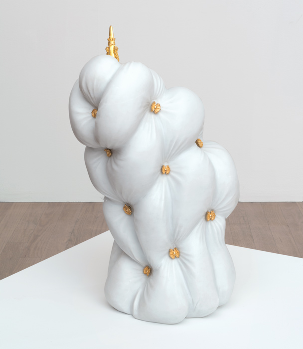 A marble sculpture resembling leather-like furniture created using digital fabrication, on exhibition at bitforms gallery