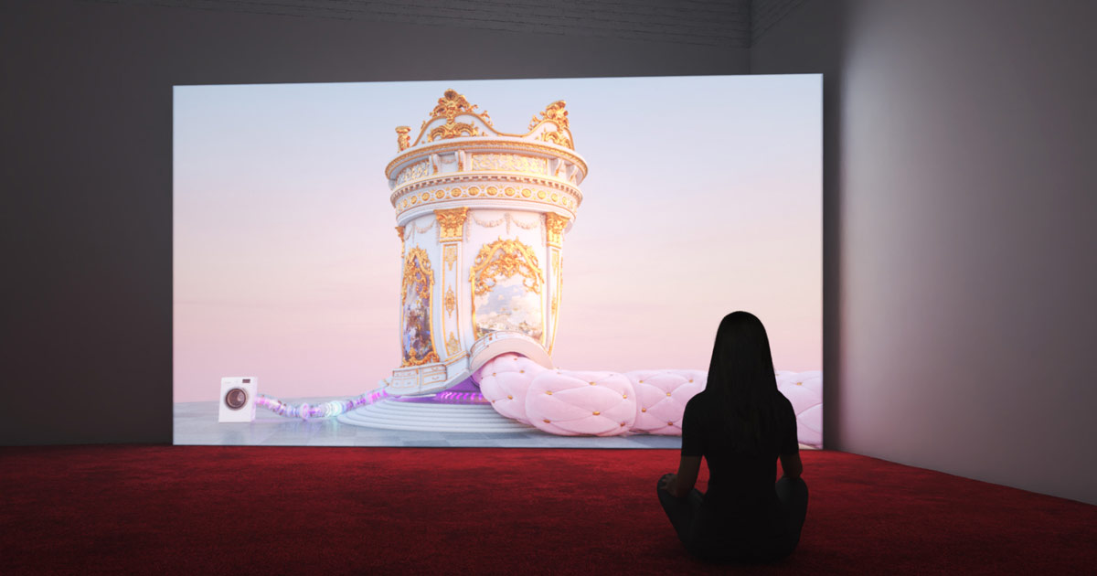 Photo of museum visitor sitting in front of video installation Den of Wolves, by Jonathan Monaghan, dim room, red carpet.